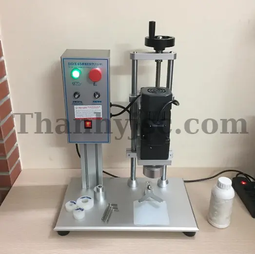 Máy Đóng Hũ Và Xoáy Nắp - TY-DX450