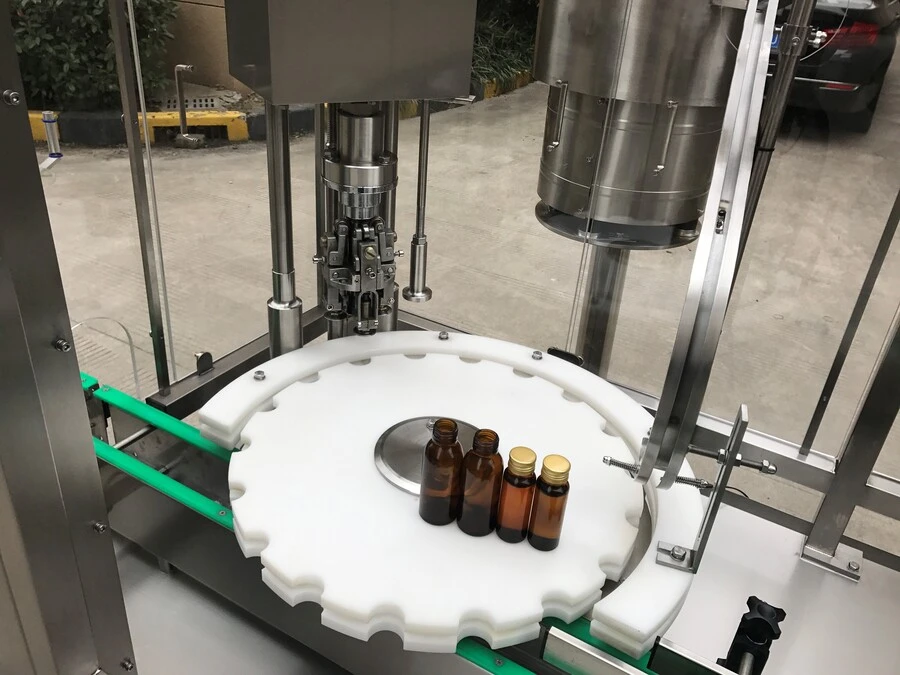 Máy Rửa và Chiết Rót Chai Tự Động 4 Vòi Bơm Nhu Động